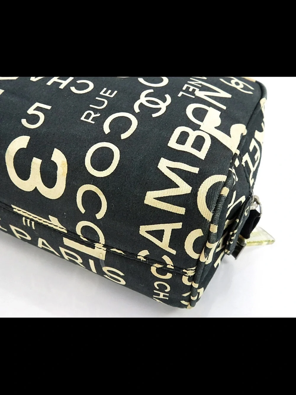 CHANEL Black Canvas Logo Print Cosmetic Pouch with Cream Lettering